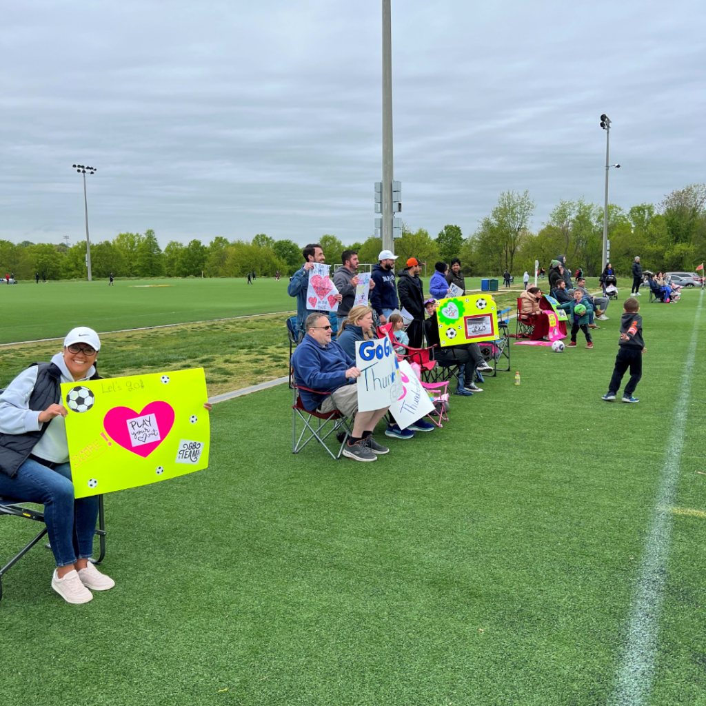 Soccer Parents with Signs